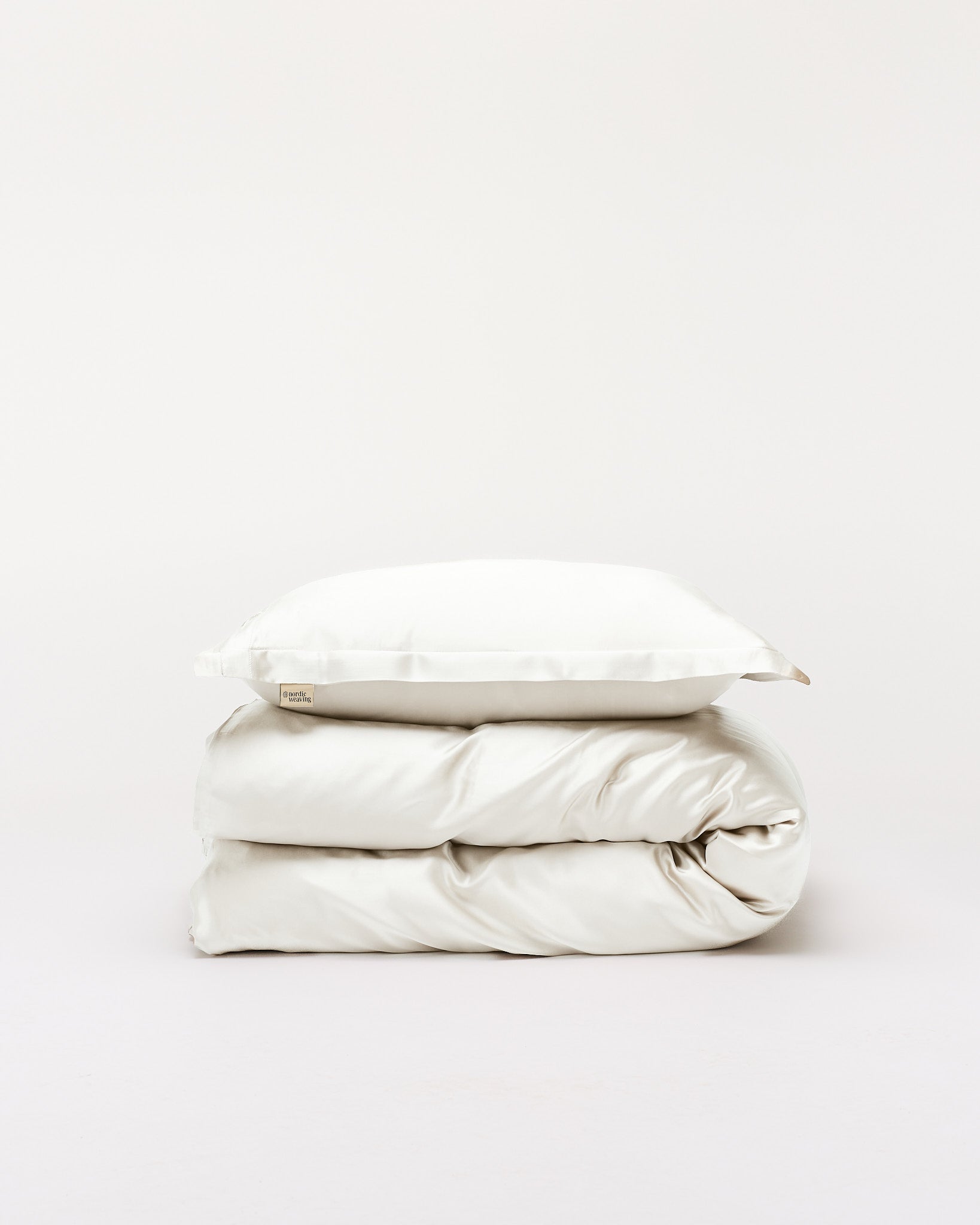 Silkesengetøj ivory